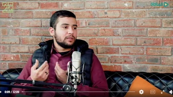 A speaker at the microphone in the prayer podcast